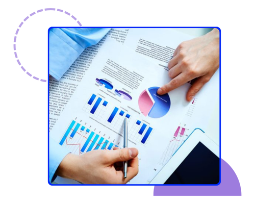 Marketer working on a desktop displaying PPC campaign analytics and icons, representing *Weekly PPC Optimization* — Brankdock